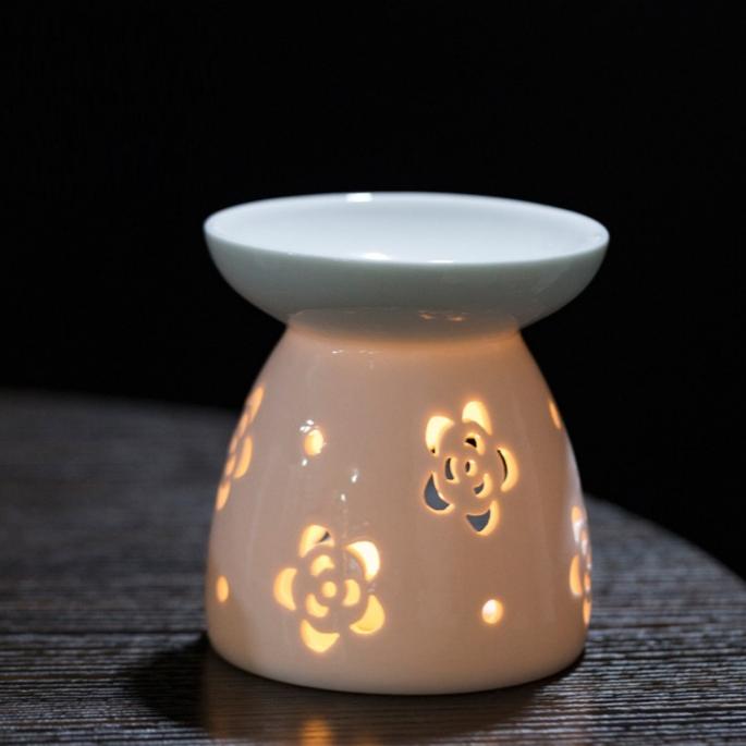 Handmade ceramic openwork incense burner and candle holder ornament